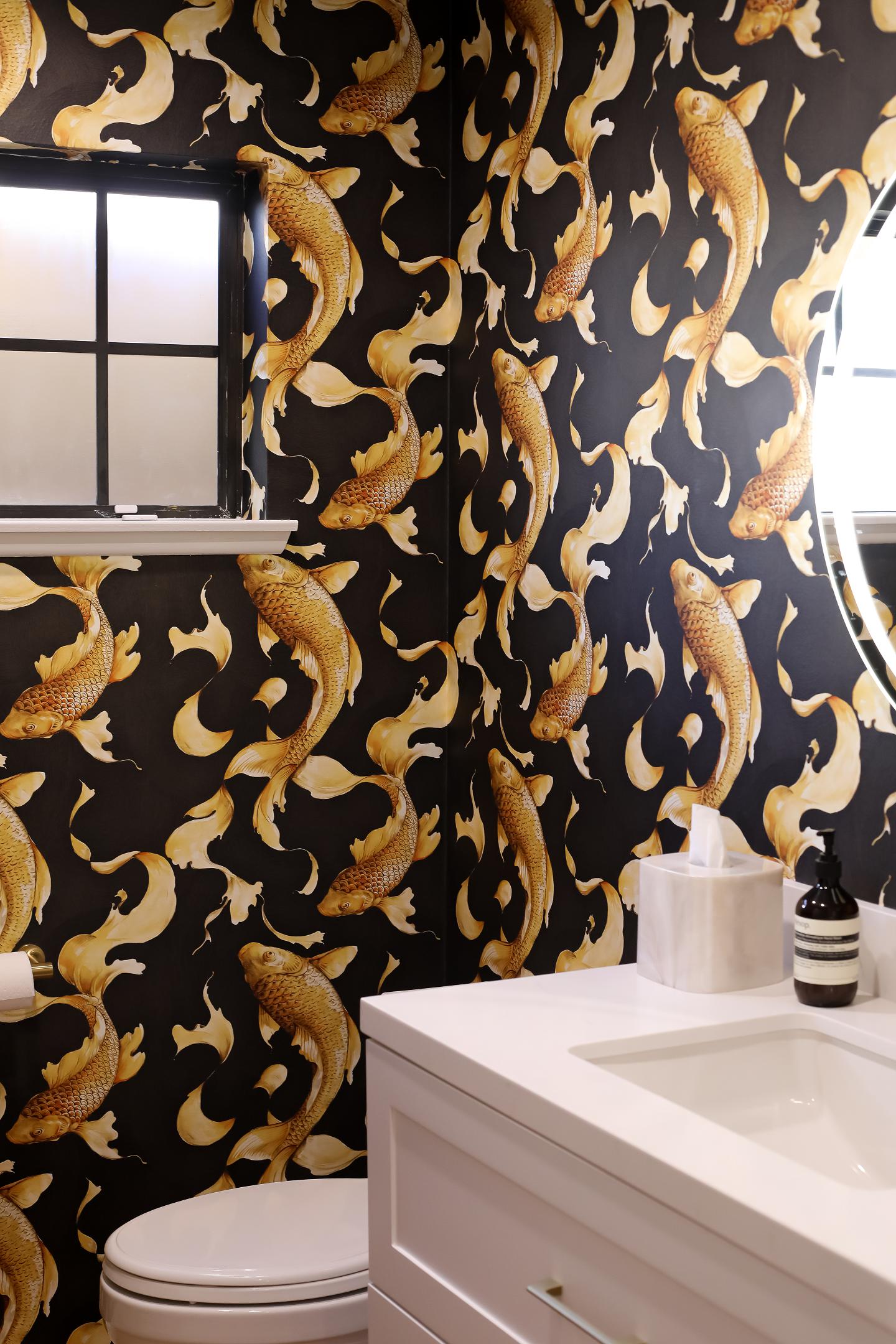 Koi fish pattern wallpaper in stylish bathroom.