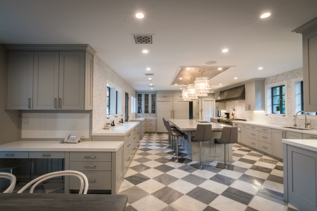 Elegant spacious kitchen with island and checkerboard floor