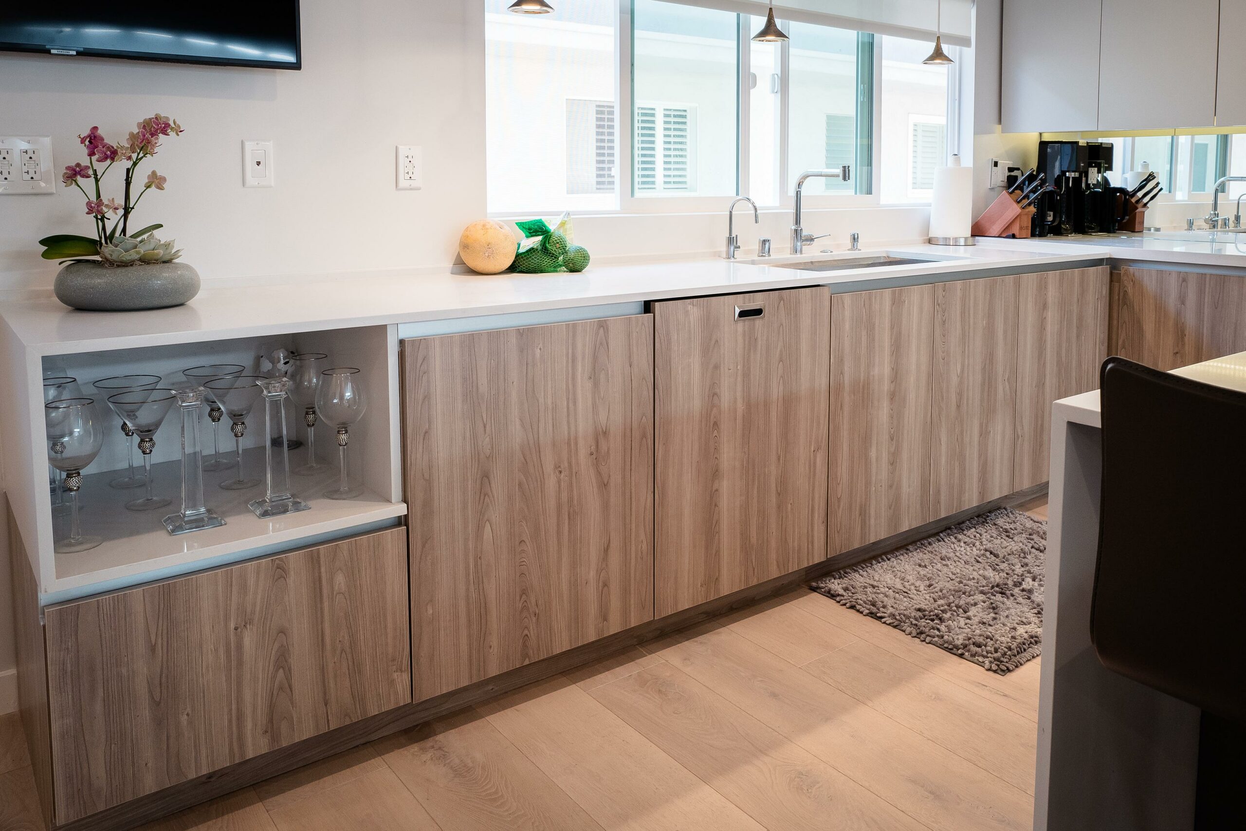 Modern kitchen interior design with wooden cabinetry.