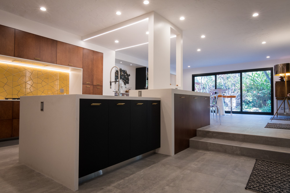 Modern kitchen interior with wooden cabinets and island
